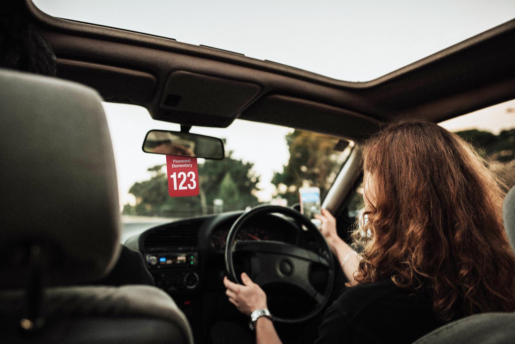 Carpool identification tags for school pickup systems